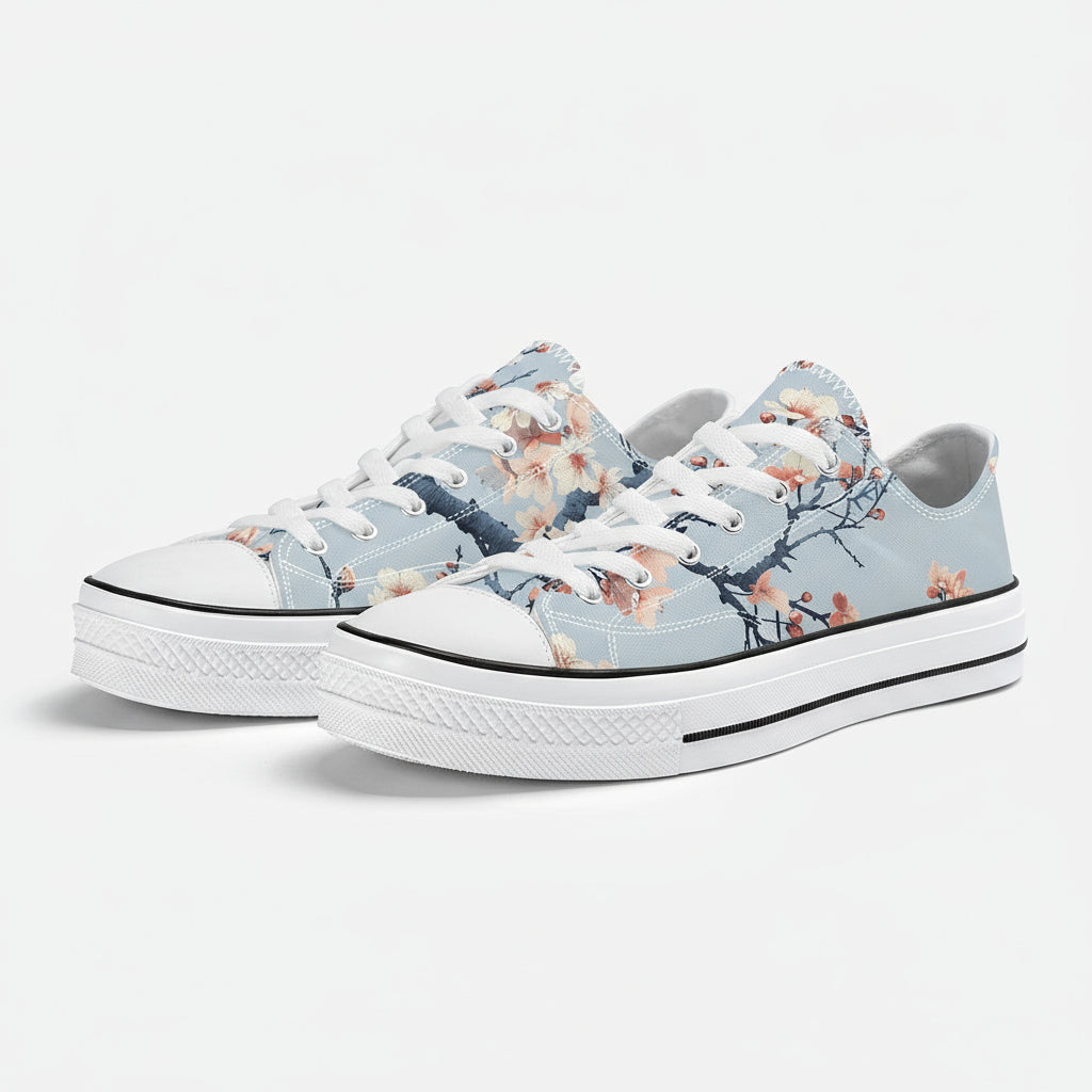 Pair of floral-patterned sneakers on a white background