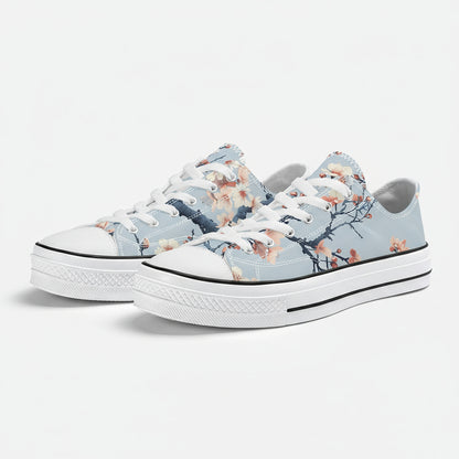 Pair of floral-patterned sneakers on a white background