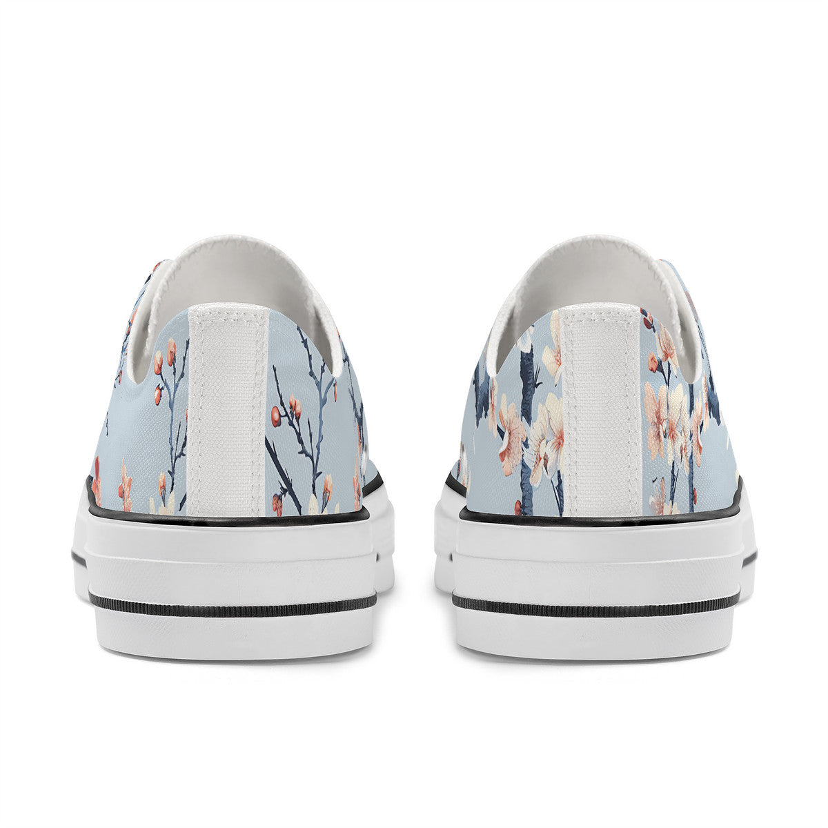 Pair of sneakers with floral design on a white background