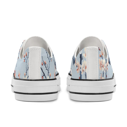Pair of sneakers with floral design on a white background