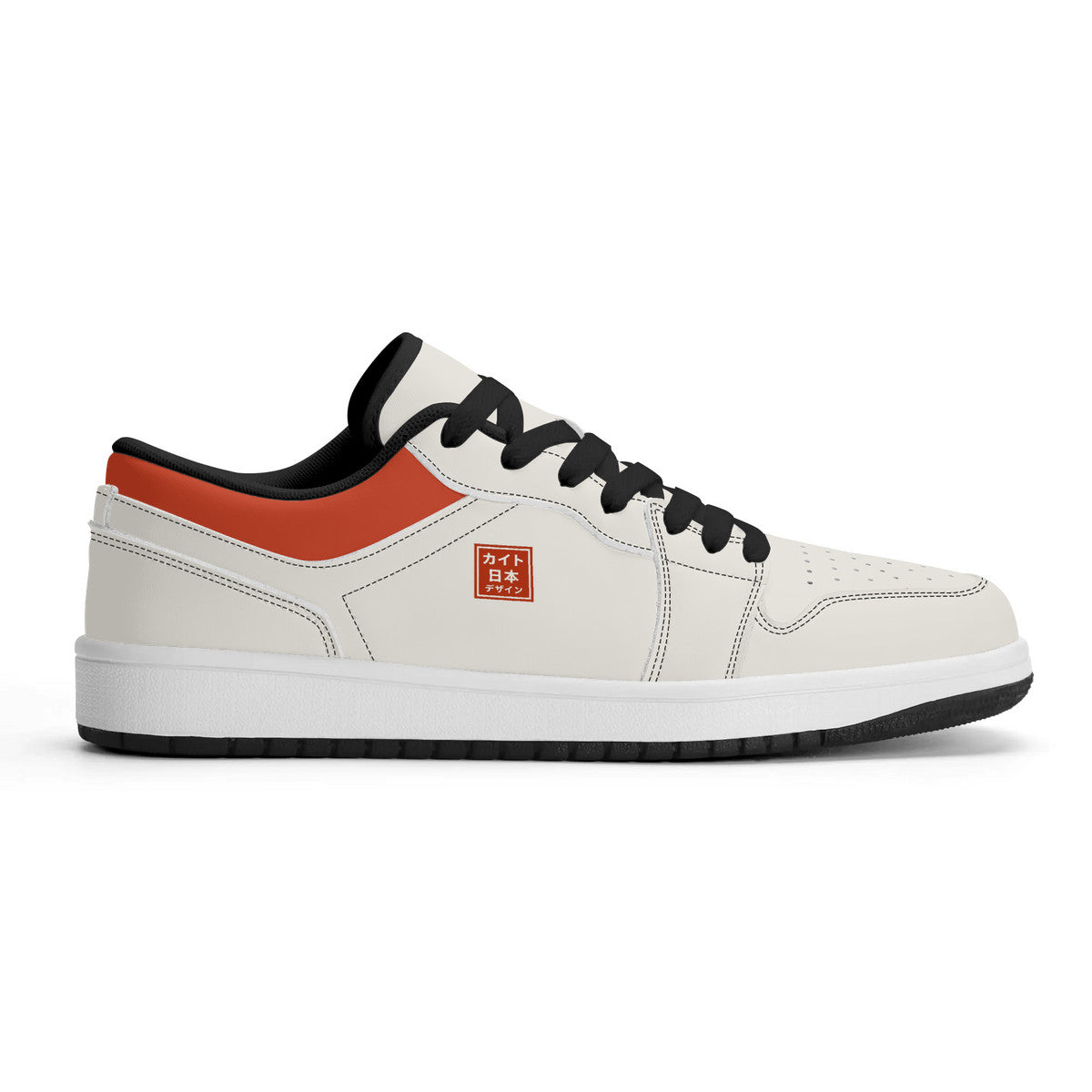 White sneaker with black and orange accents on a white background