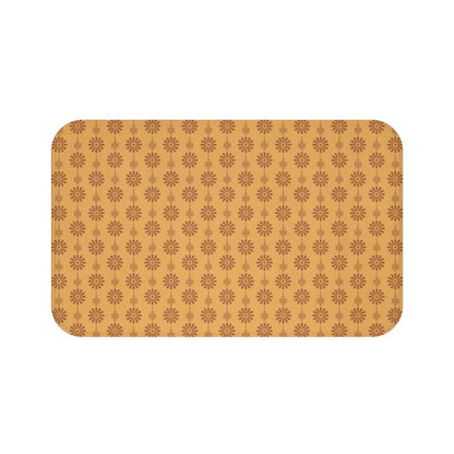 Burnt Orange flowers on a Light Orange Bath Mat.   Japanese style bathmats are the perfect finishing flourish for a stylish, personality-filled bathroom, and this bath mat is as practical, as it is stylish - the anti-slip backing keeps the bath mat firmly in place and reduces the risk of slipping. 100% Microfiber. Vibrant print exit in 2 sizes 34” x 21” (86 x 53 cm) or 24” x 17” (61 x 43 cm). Anti-slip backing. Binding around the edges. Machine wash cold, gentle cycle. Tumble dry low or line dry. 