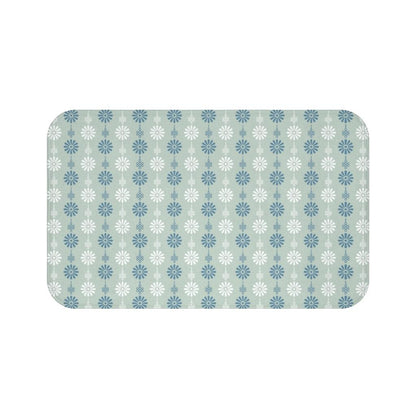 Blue, Grey and White Japanese Flower Bath Mat.   Japanese style bathmats are the perfect finishing flourish for a stylish, personality-filled bathroom, and this bath mat is as practical, as it is stylish - the anti-slip backing keeps the bath mat firmly in place and reduces the risk of slipping. 100% Microfiber. Vibrant print exit in 2 sizes 34” x 21” (86 x 53 cm) or 24” x 17” (61 x 43 cm). Anti-slip backing. Binding around the edges. Machine wash cold, gentle cycle. Tumble dry low or line dry. 
