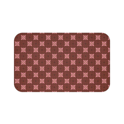Pink Flower on Dark Burgundy Japanese Pattern Bath Mat.   Japanese style bathmats are the perfect finishing flourish for a stylish, personality-filled bathroom, and this bath mat is as practical, as it is stylish - the anti-slip backing keeps the bath mat firmly in place and reduces the risk of slipping. 100% Microfiber. Vibrant print exit in 2 sizes 34” x 21” (86 x 53 cm) or 24” x 17” (61 x 43 cm). Anti-slip backing. Binding around the edges. Machine wash cold, gentle cycle. Tumble dry low or line dry. 