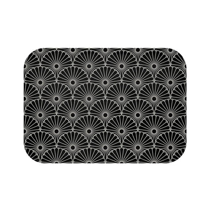 Large Black Japanese Flower on Grey Background Bath Mat.   Japanese style bathmats are the perfect finishing flourish for a stylish, personality-filled bathroom, and this bath mat is as practical, as it is stylish - the anti-slip backing keeps the bath mat firmly in place and reduces the risk of slipping. 100% Microfiber. Vibrant print exit in 2 sizes 34” x 21” (86 x 53 cm) or 24” x 17” (61 x 43 cm). Anti-slip backing. Binding around the edges. Machine wash cold, gentle cycle. Tumble dry low or line dry. 