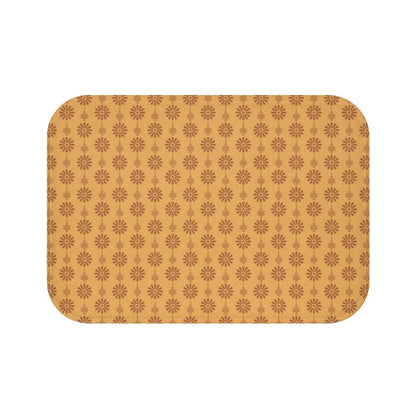 Burnt Orange flowers on a Light Orange Bath Mat.   Japanese style bathmats are the perfect finishing flourish for a stylish, personality-filled bathroom, and this bath mat is as practical, as it is stylish - the anti-slip backing keeps the bath mat firmly in place and reduces the risk of slipping. 100% Microfiber. Vibrant print exit in 2 sizes 34” x 21” (86 x 53 cm) or 24” x 17” (61 x 43 cm). Anti-slip backing. Binding around the edges. Machine wash cold, gentle cycle. Tumble dry low or line dry. 