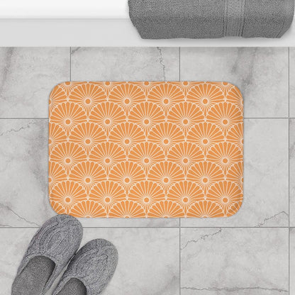 White Flowers on a Light Orange Background Bath Mat.   Japanese style bathmats are the perfect finishing flourish for a stylish, personality-filled bathroom, and this bath mat is as practical, as it is stylish - the anti-slip backing keeps the bath mat firmly in place and reduces the risk of slipping. 100% Microfiber. Vibrant print exit in 2 sizes 34” x 21” (86 x 53 cm) or 24” x 17” (61 x 43 cm). Anti-slip backing. Binding around the edges. Machine wash cold, gentle cycle. Tumble dry low or line dry. 