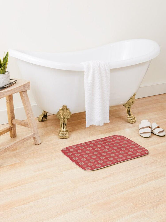 Dark Gold Flower on Red Background Bath Mat.   Japanese style bathmats are the perfect finishing flourish for a stylish, personality-filled bathroom, and this bath mat is as practical, as it is stylish - the anti-slip backing keeps the bath mat firmly in place and reduces the risk of slipping. 100% Microfiber. Vibrant print exit in 2 sizes 34” x 21” (86 x 53 cm) or 24” x 17” (61 x 43 cm). Anti-slip backing. Binding around the edges. Machine wash cold, gentle cycle. Tumble dry low or line dry. 
